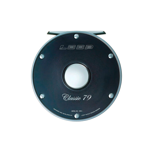 Loop Classic Series reel with teal face, engraved details, and center spool