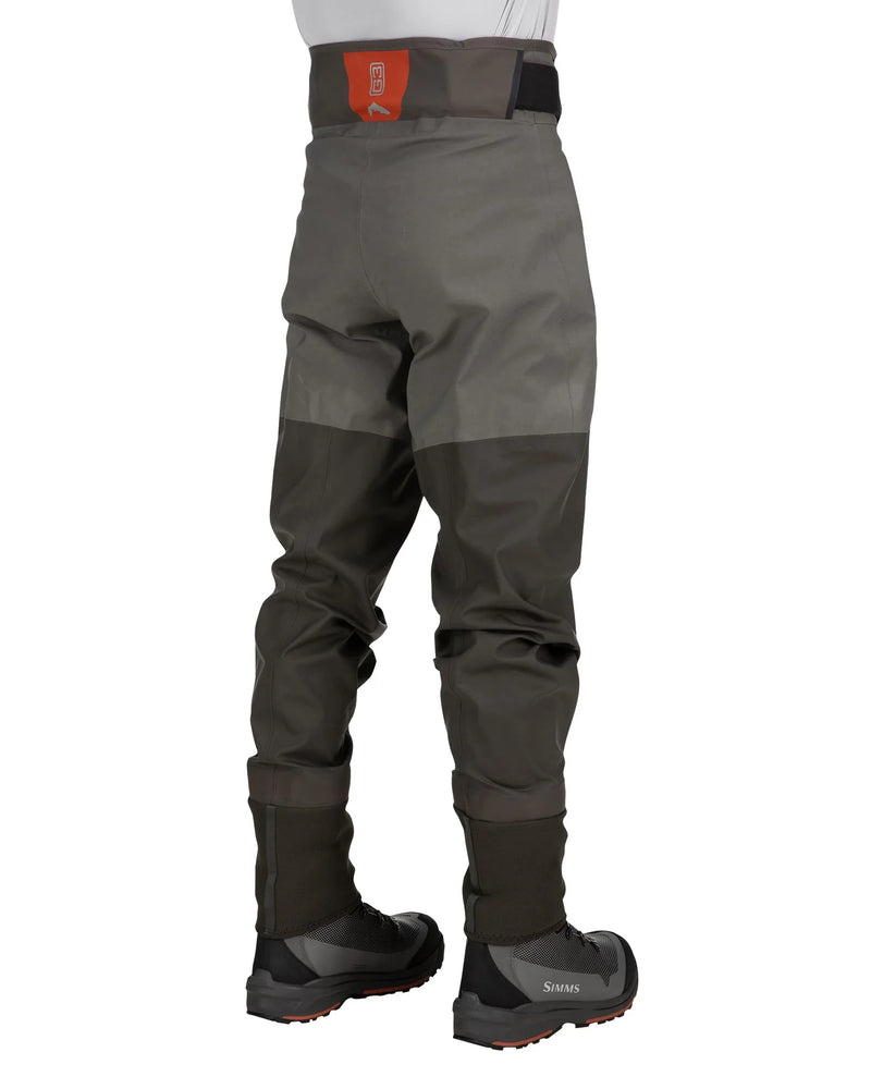 Load image into Gallery viewer, Men’s guide pants back view with belt, gray fabric, dark paneling, red waistband label
