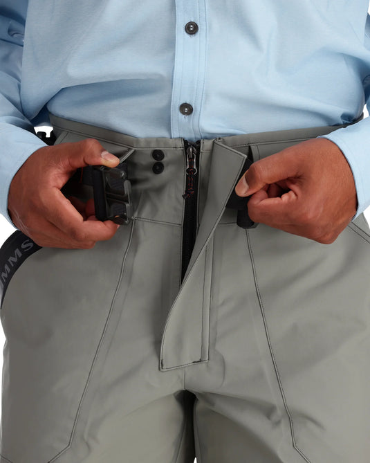 Men's pant wader close-up, front closure with leg pocket flap and straps