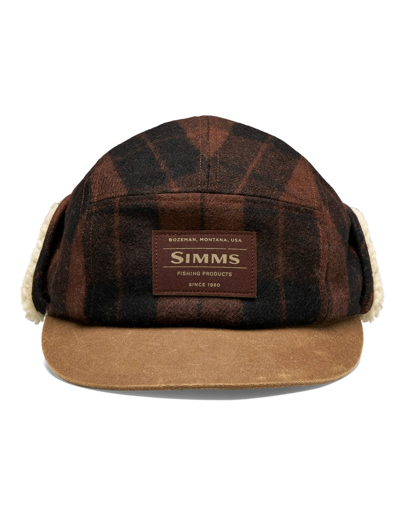 Load image into Gallery viewer, Brown buffalo plaid coldweather cap with tan brim, ear flaps, and sherpa lining; Simms patch.
