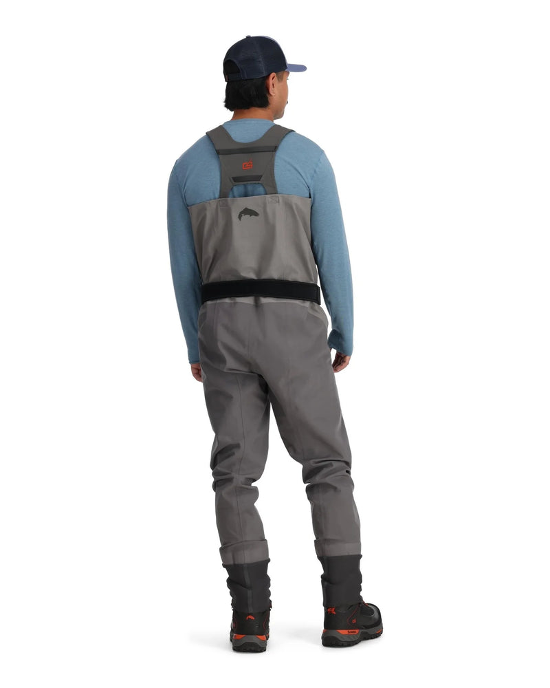 Load image into Gallery viewer, Gray stockingfoot waders shown from back with shoulder straps and black booties
