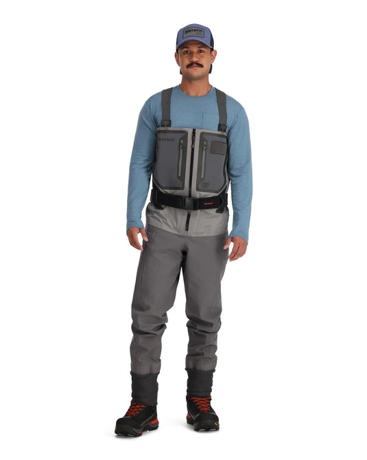 Gray stockingfoot waders with chest straps and black neoprene booties