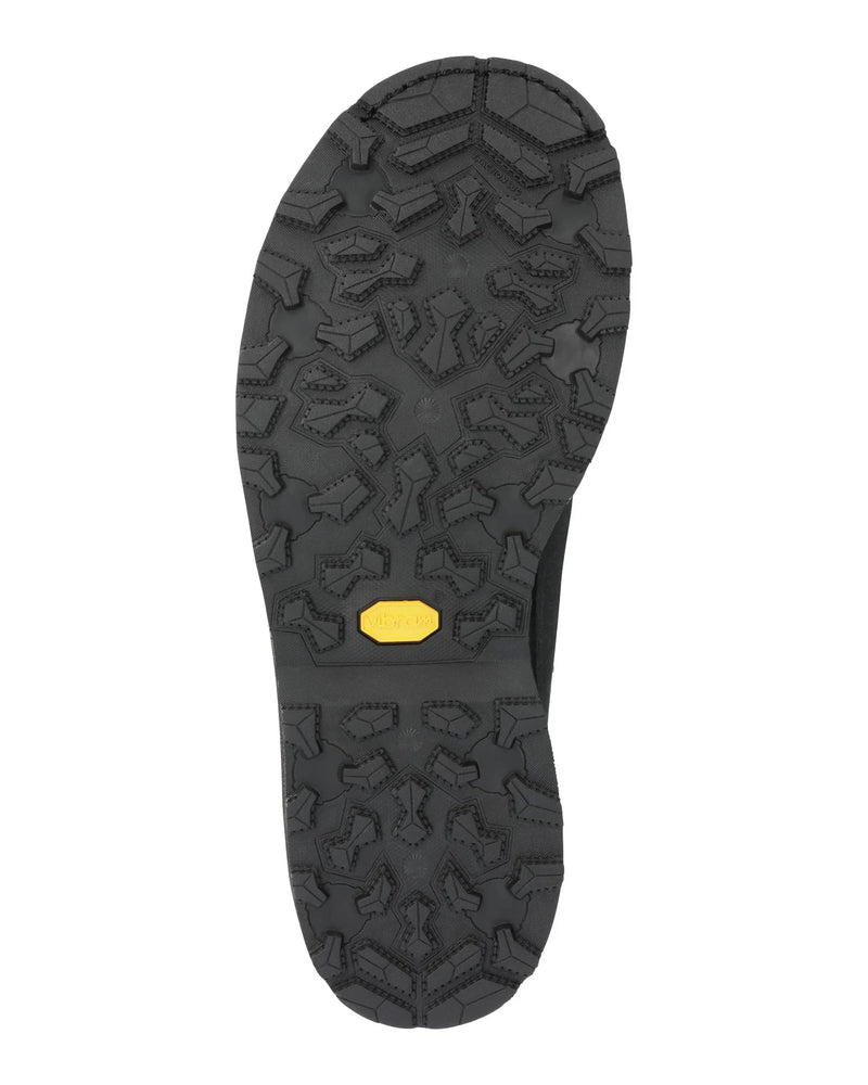 Load image into Gallery viewer, Men’s guide boot outsole with deep tread pattern and small yellow brand patch
