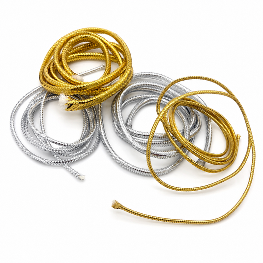 Mixed mylar piping cords, gold and silver braided lengths with coiled loops