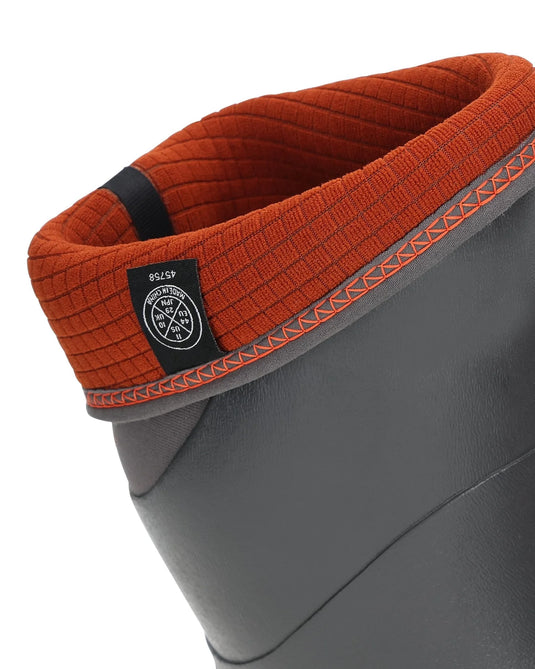 Men's tall boot cuff with orange quilted lining and gray rubber upper