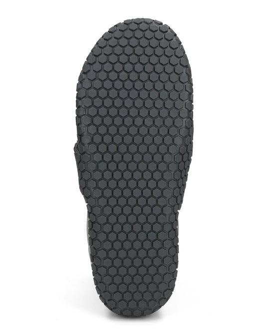 Dark gray bootie outsole with hex-pattern tread