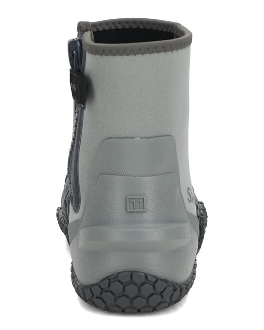 Back view of dark gray zippered bootie with SIMMS logo and hex tread sole