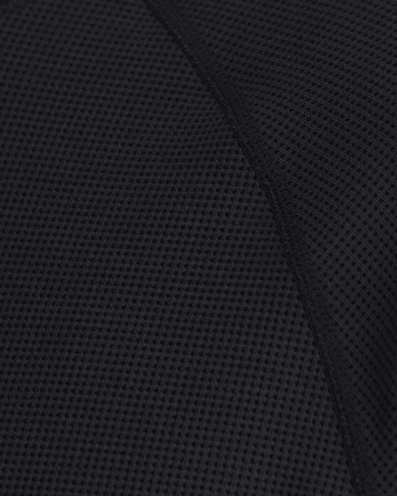 Load image into Gallery viewer, Black textured knit hoodie fabric close-up
