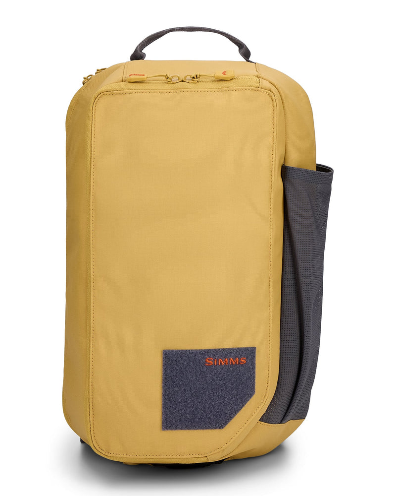Load image into Gallery viewer, Simms Tributary sling pack, tan front panel with Simms patch and carry handle
