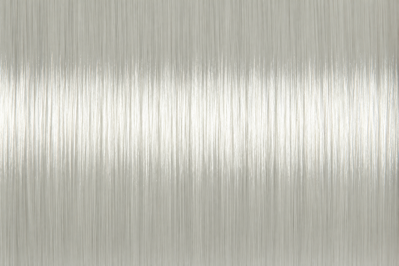 Load image into Gallery viewer, White thread strand close-up with fine, tightly woven texture
