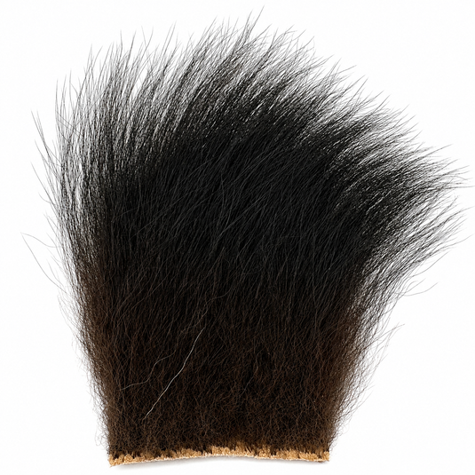 Black Bear fly tying hair tuft with long dark fibers
