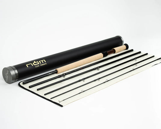 Fishing rod set in black tube with rod sections and line guides