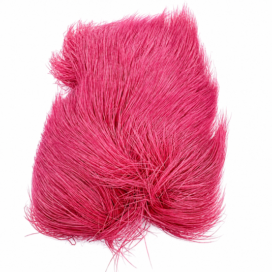 Darmor deer body hair tuft in bright pink, fluffy loose fibers