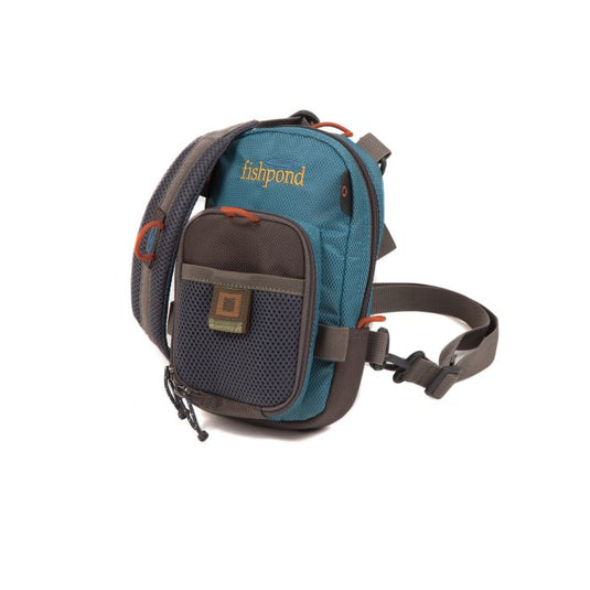 Fishpond San Juan vertical chest pack with teal and brown panels, front pocket and strap