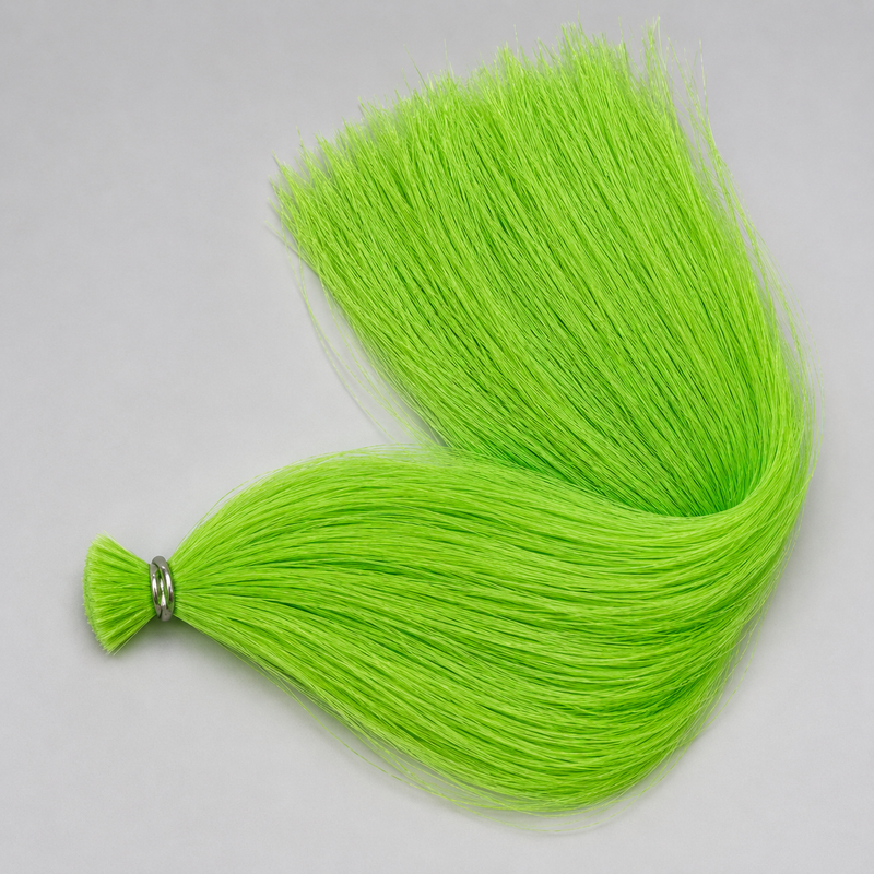 Load image into Gallery viewer, Fluorescent green yarn coil with long strands and loop tassel
