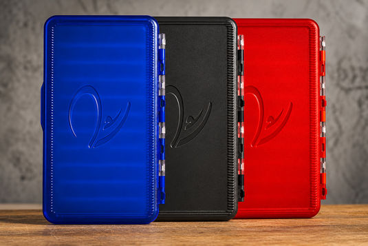 Stealth Box hard storage case, shown in blue, black, and red with metal clasps