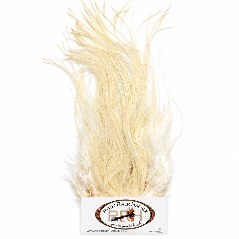 Load image into Gallery viewer, Root River Saddle feather tuft in light cream fibers
