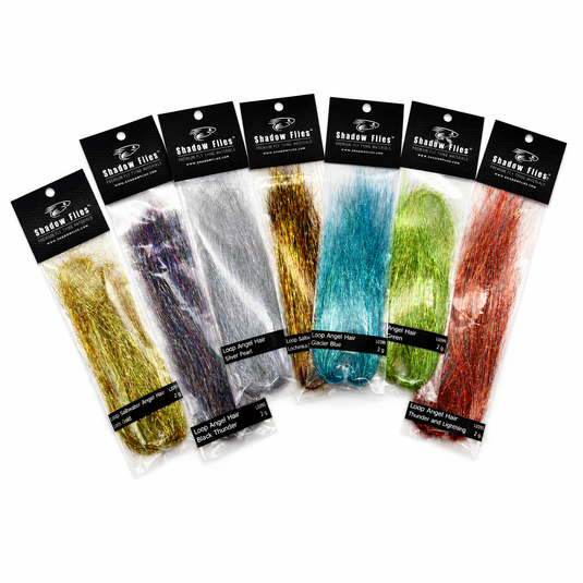 Assorted loop angel hair bundles with metallic strands in multiple colors, in retail packs