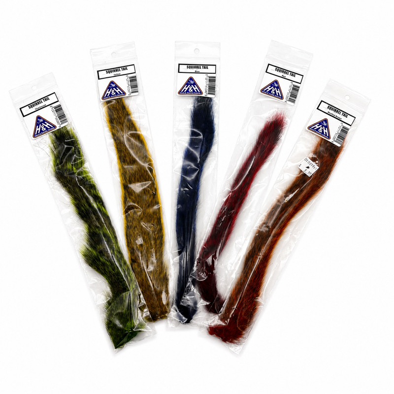 Load image into Gallery viewer, Squirrel tail hackle strips in assorted colors, shown in clear sealed bags
