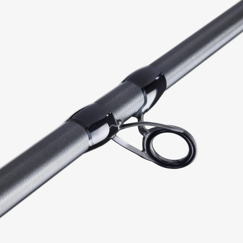 Load image into Gallery viewer, Fishing rod eyelets and line guide near the black reel seat
