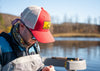 Red trucker hat with white mesh back and Fulling Mill logo patch