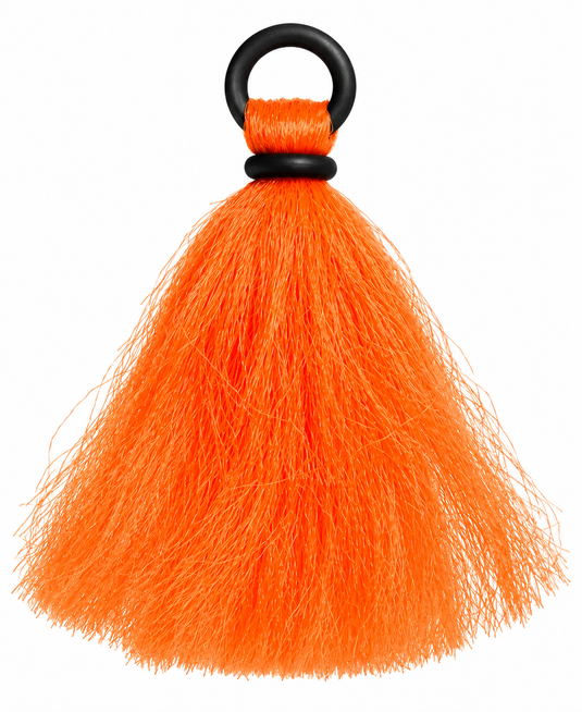 Large orange yarn indicator with a fluffy tassel and black loop attachment.