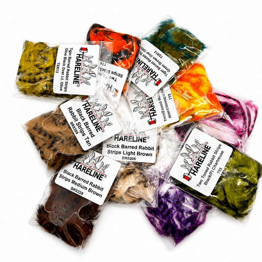 Hareline rabbit strip assortment with multiple barred color packs in plastic