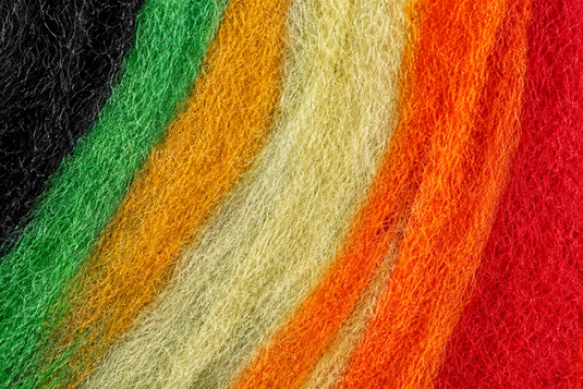 Betts Z-Lon yarn strands in mixed green, orange, red, yellow, and black