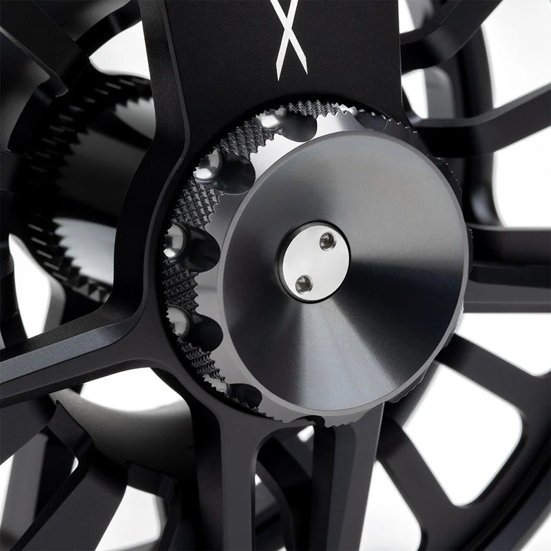 Load image into Gallery viewer, Fly fishing reel close-up of center spool with textured drag ring
