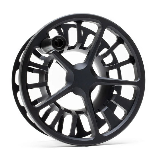 Fly fishing reel angled view with large arched spoke design and dark spool