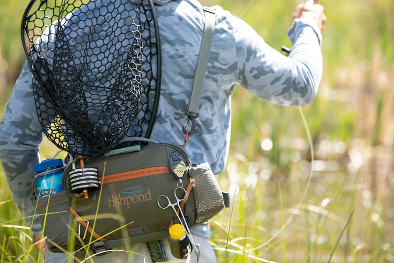 Load image into Gallery viewer, Lumbar fishing pack worn on back with black net pocket and front pouches
