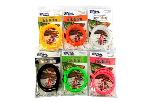 Body tubing set with coiled yellow, red, white, black, green, and pink tubing in packs