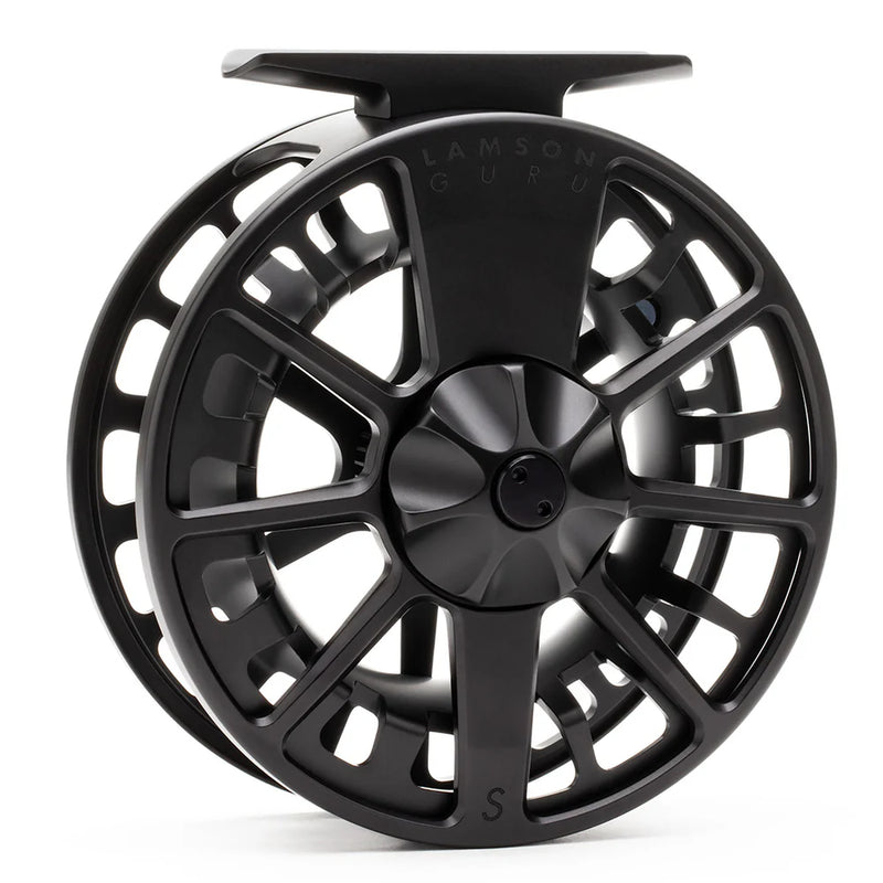 Load image into Gallery viewer, Black fly fishing reel showing 'LAMSON GURU' lettering on spool support
