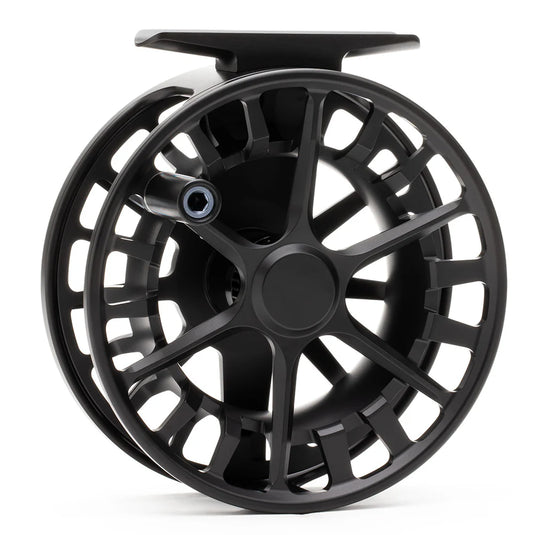 Black fly fishing reel with large spoked frame and central drag knob