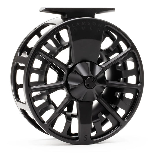 Black fly fishing reel with cutout spokes and central disc.