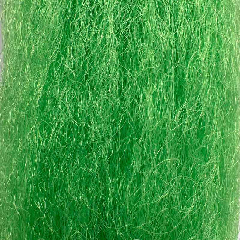 Load image into Gallery viewer, Green fishing fiber material with dense, wispy strands.
