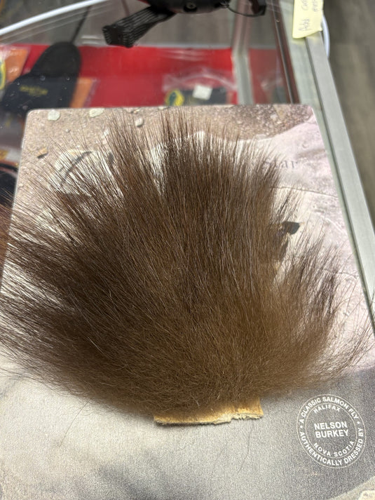 Brown faux fur bear hair patch, rounded base