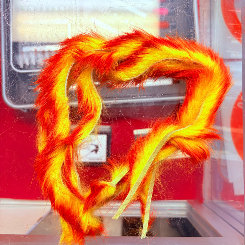 Load image into Gallery viewer, Fishing rabbit fur strips with bright orange-red and yellow, wavy loops
