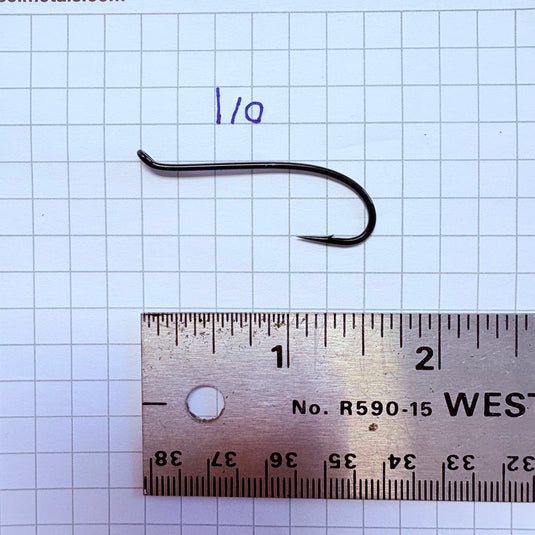 Fishing hook size 1/0, dark metal, curved shank with barbed tip