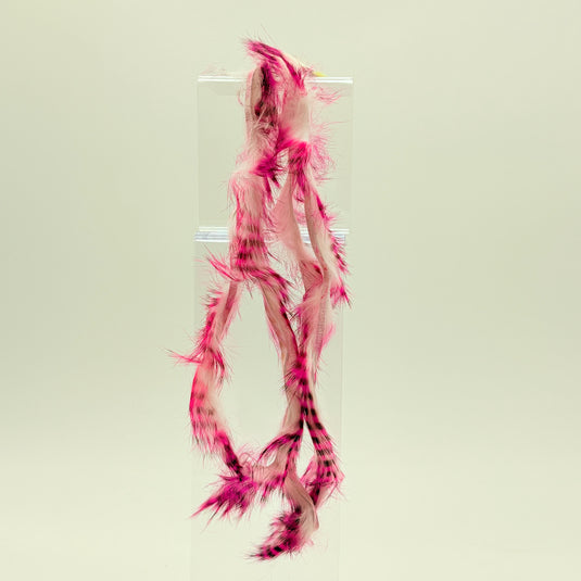 Rabbit fur strip with hot pink and black barred fibers