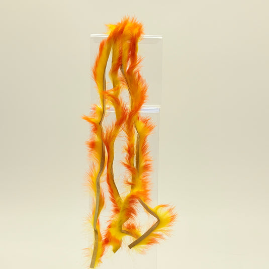 Rabbit fur strip with bright orange and yellow barred fibers