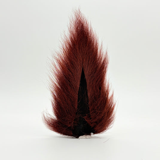 Darmor bucktail lure, maroon hair tuft with black base