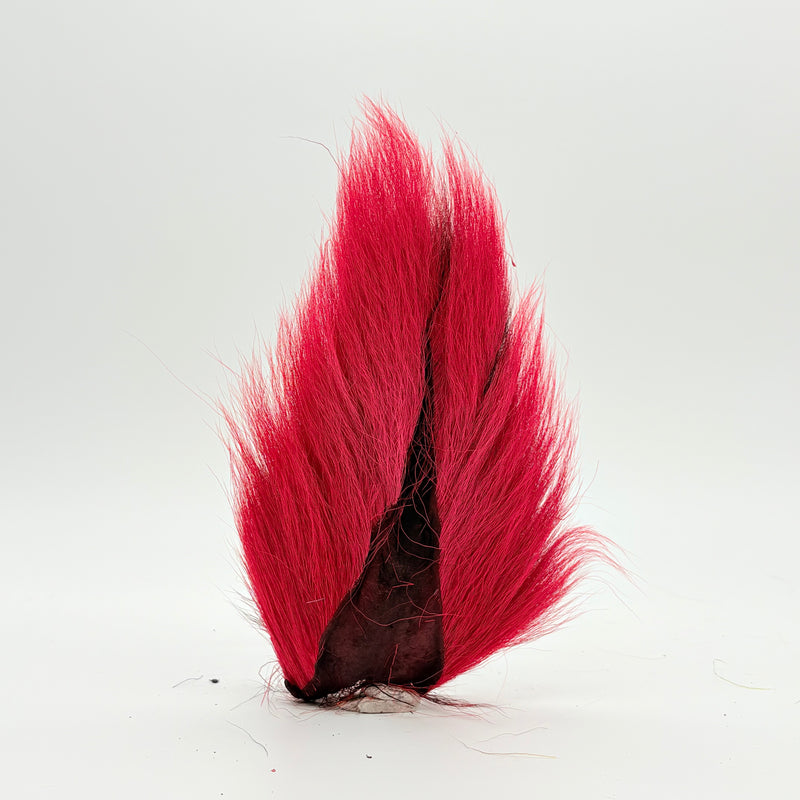 Load image into Gallery viewer, Red bucktail-style fly tail with dark mottled base

