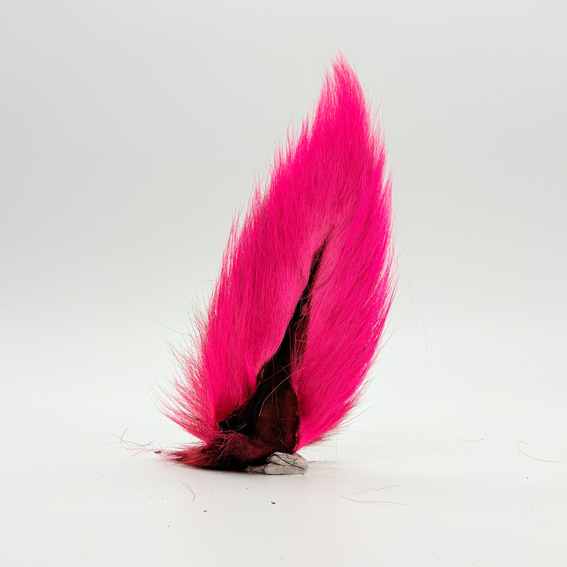 Load image into Gallery viewer, Pink bucktail-style fly tail with dark mottled base
