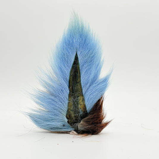 Light blue bucktail-style fly tail with dark mottled base