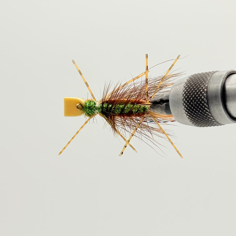 Load image into Gallery viewer, Fishing fly lure with orange-brown thorax, green bead head, and crossed straw legs
