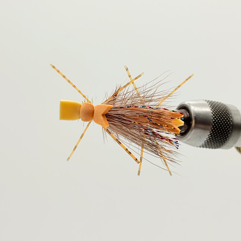 Load image into Gallery viewer, Fishing fly lure with yellow tail, spiky legs, and orange-brown hackle
