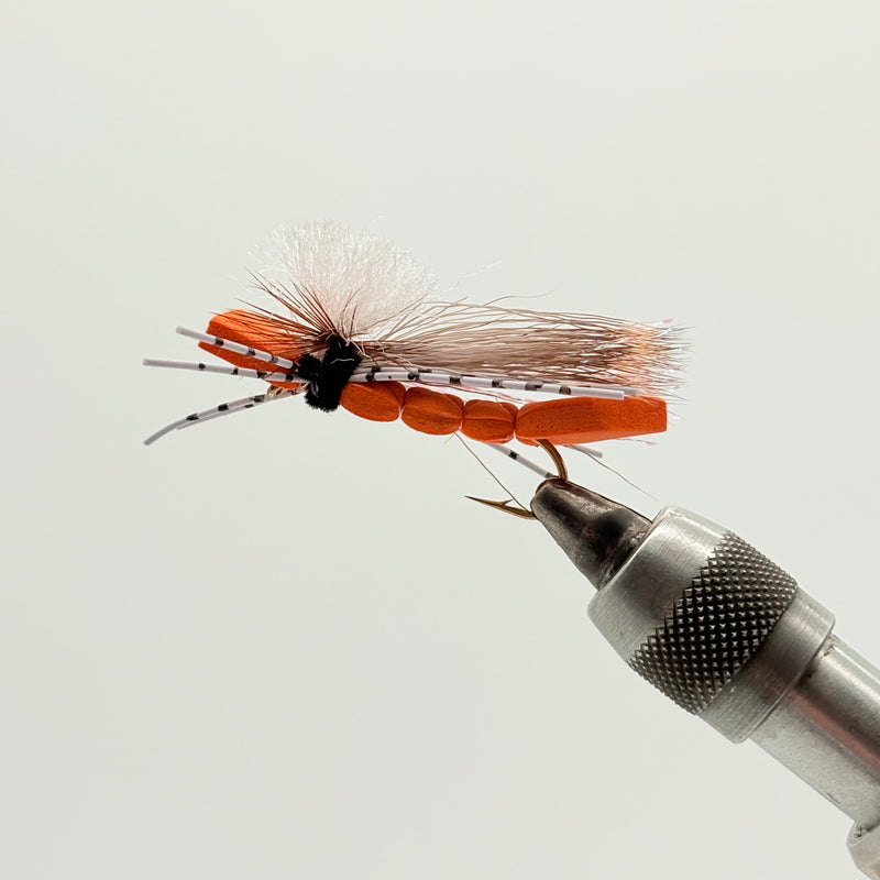 Load image into Gallery viewer, Orange foam hopper fly with black head, orange body, and sparse feather legs
