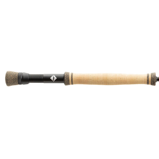 Fly fishing rod with cork handle and black reel seat, graphite-style shaft