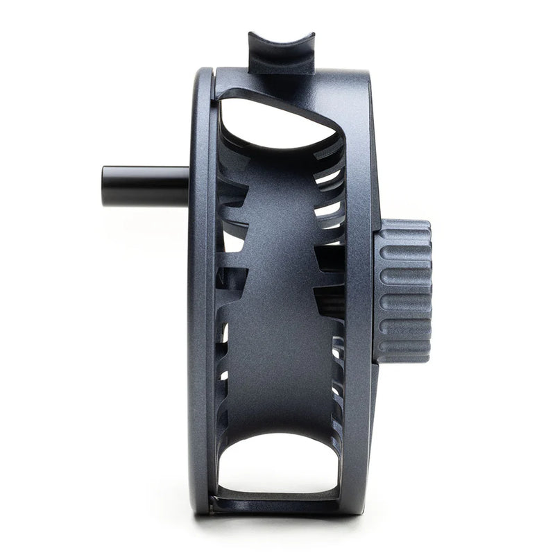 Load image into Gallery viewer, Fly fishing reel side view with dark gray frame and ridged adjustment dial
